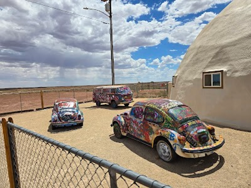 RV stop along route 66 with decorative cars